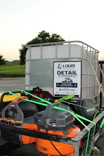 Detailing equipment and water tank secured on a trailer