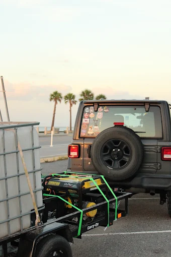 Mobile-detailing trailer in an outdoor parking area
